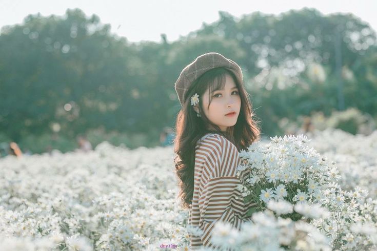 goi chup anh voi cuc hoa mi